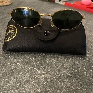 Ray-Ban Gold Frame Oval Sunglasses with Dark Green Lenses